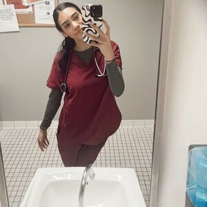 women’s maroon scrubs